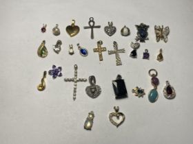 TWENTY SEVEN VARIOUS PENDANTS