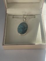 A SILVER BOXED NECKLACE