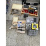 A LARGE ASSORTMENT OF TOOLS TO INCLUDE ROUTER BITS AND DRILL AUGER BITS ETC