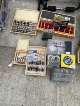 A LARGE ASSORTMENT OF TOOLS TO INCLUDE ROUTER BITS AND DRILL AUGER BITS ETC