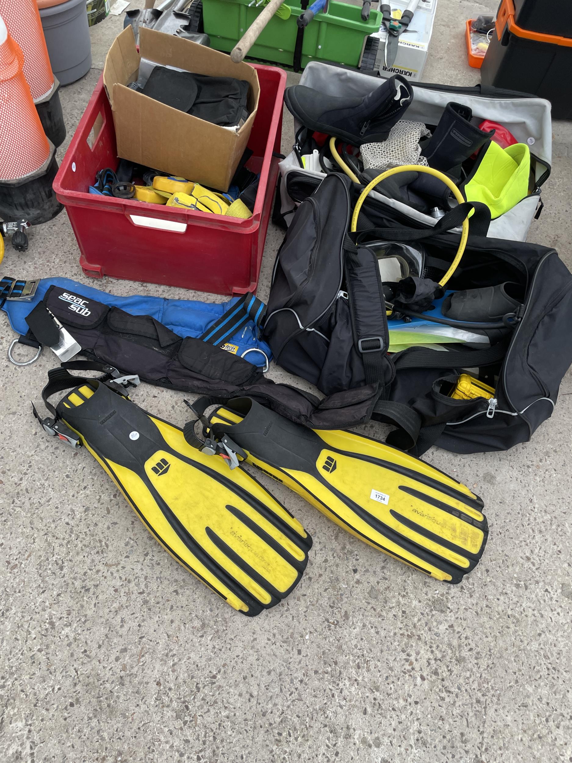 A LARGE QUANTITY OF SCUBA DIVING EQUIPMENT TO INCLUDE FLIPPERS, WEIGHTS AND MOUTH PIECES ETC