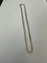 A SILVER BOXED NECKLACE