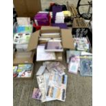 A LARGE ASSORTMENT OF CRAFTING ITEMS TO INCLUDE CARDS AND PAPERS ETC