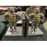 A PAIR OF MICHELIN MEN METAL CHROMED BOOK-ENDS, HEIGHT 14CM