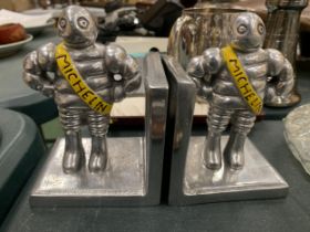 A PAIR OF MICHELIN MEN METAL CHROMED BOOK-ENDS, HEIGHT 14CM