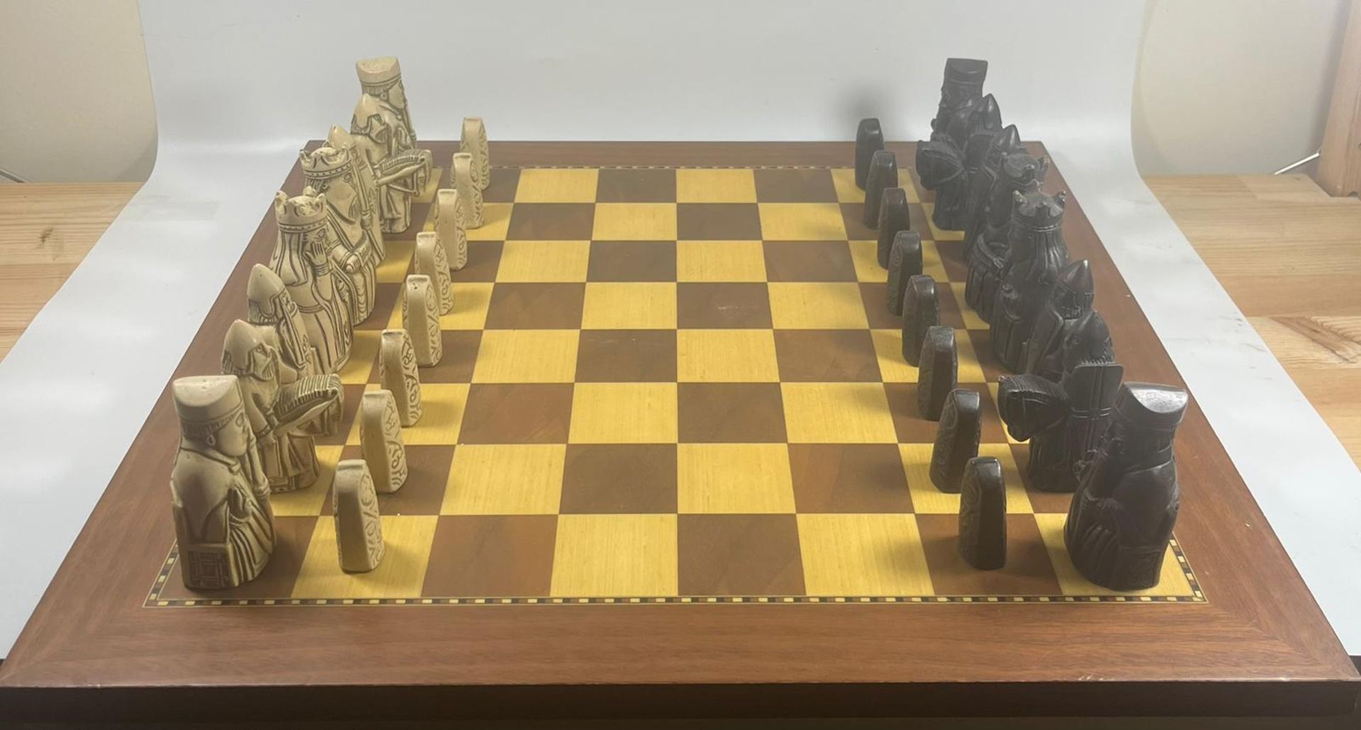A VINTAGE LEWIS CHESSMEN CHESS SET MODELLED AS MEDIEVAL FIGURES ON AN INLAID WOODEN BOARD, KING - Image 2 of 5