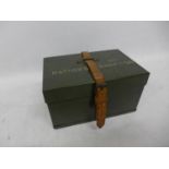 A 1950'S TWO MAN RATION PACK METAL BOX WITH LEATHER STRAP