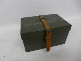 A 1950'S TWO MAN RATION PACK METAL BOX WITH LEATHER STRAP