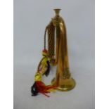 A COPPER AND BRASS BUGLE WITH ROYAL ARTILLERY BADGE, LENGTH 27.5CM