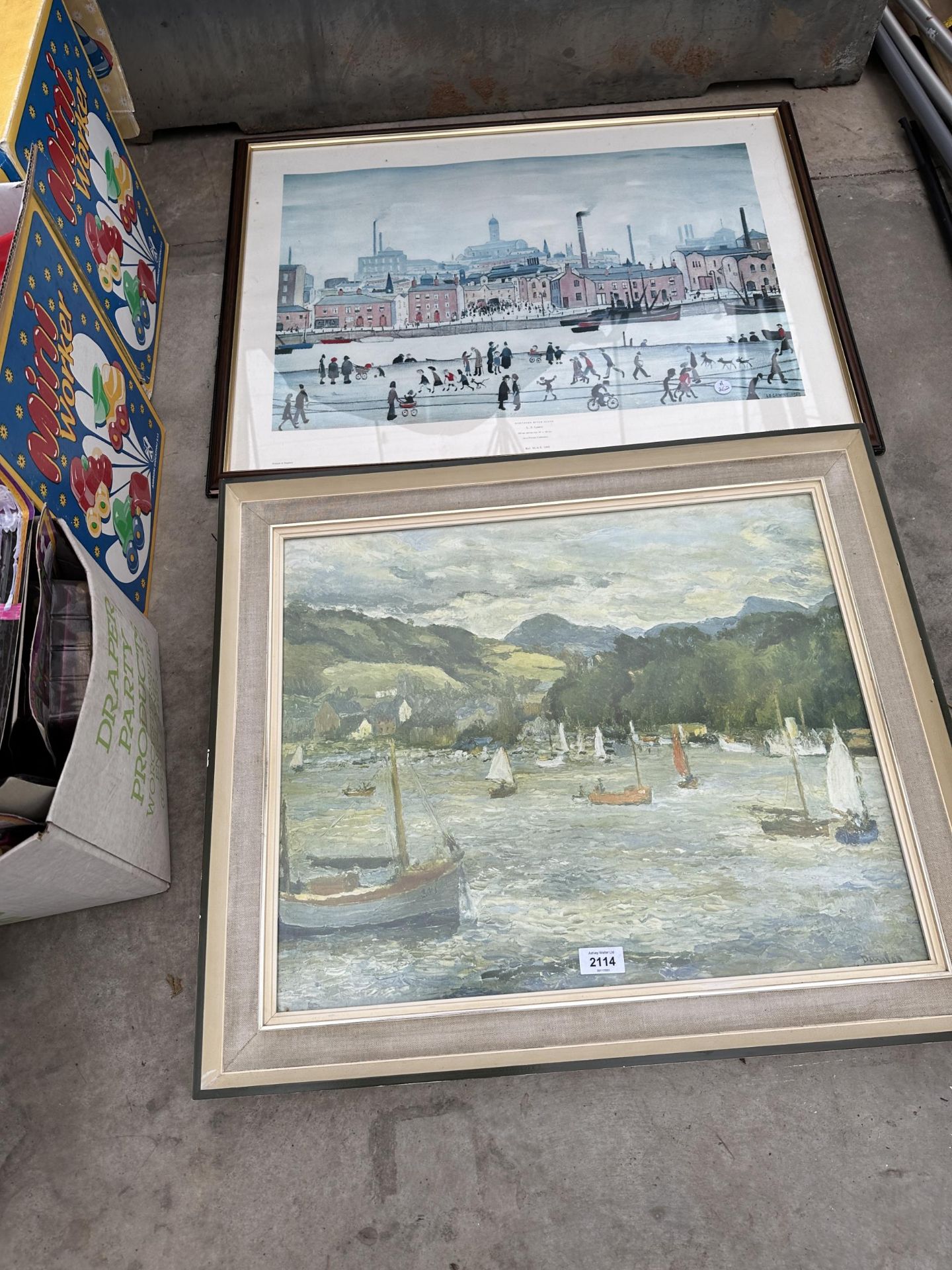 A FRAMED LOWRY PRINT AND A FURTHER FRAMED PRINT ON BOARD