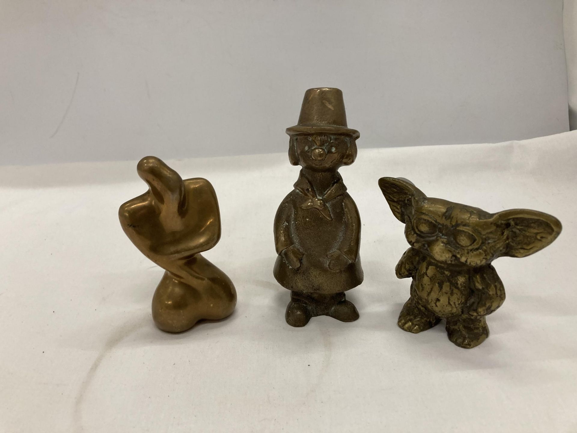 THREE HEAVY BRASS FIGURES TO INCLUDE YODA, WINDY MILLER, ETC