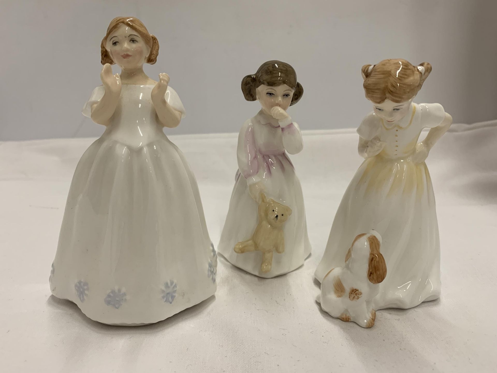 THREE ROYAL DOULTON FIGURES - 'CATHERINE' HN3044, 'DADDY'S GIRL' HN3435 AND HN3123 (ALL SECONDS)