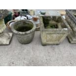 TWO CONCRETE GARDEN PLANTERS