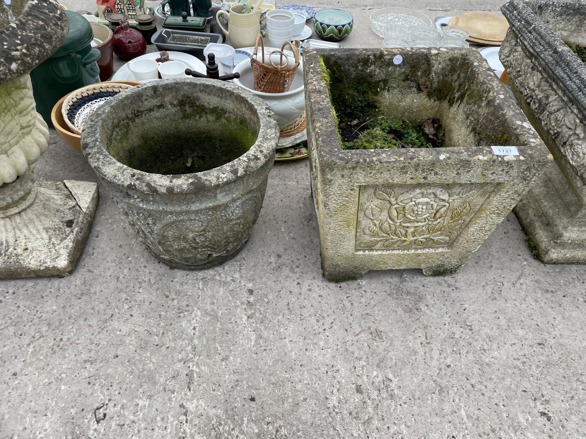 TWO CONCRETE GARDEN PLANTERS