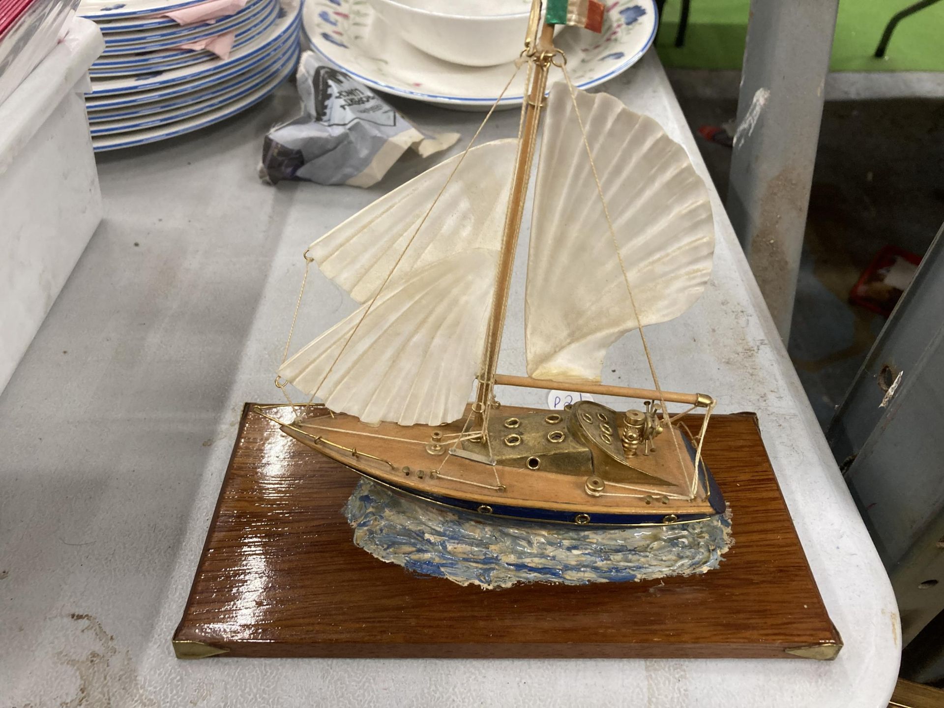 A MODEL OF A VINTAGE ITALIAN YACHT, ON A WOODEN PLINTH, WITH ENAMEL AND BRASS HULL, HEIGHT APPROX - Image 2 of 3