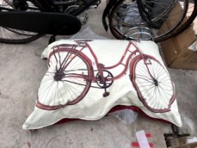 A LARGE BEAN BAG DEPICTING A BIKE