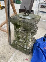 A DECORATIVE CONCRETE GARDEN SUN DIAL