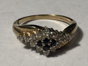 A 9 CARAT GOLD RING WITH SAPPHIRES AND CUBIC ZIRCONIAS SIZE Q