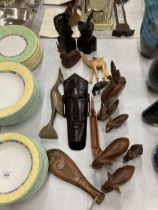 A COLLECTION OF TREEN TRIBAL WOODEN ITEMS, ELEPHANTS, MASK ETC