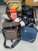 A LARGE ASSORTMENT OF PHOTOGRAPHY EQUIPMENT TO INCLUDE CAMERAS AND CAMERA BAGS ETC