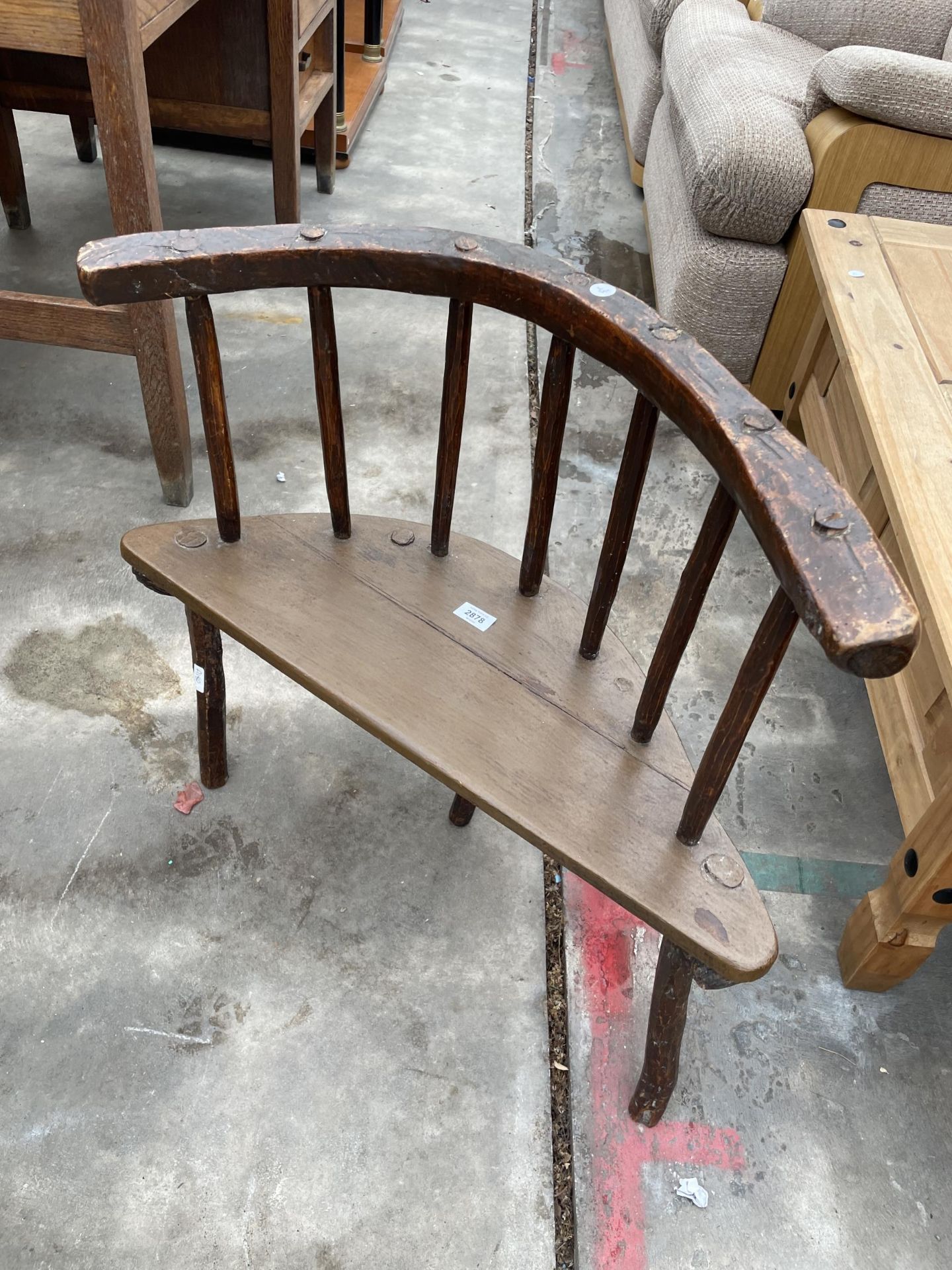 A PRIMITIVE IRISH STYLE RUSTIC STICK CHAIR