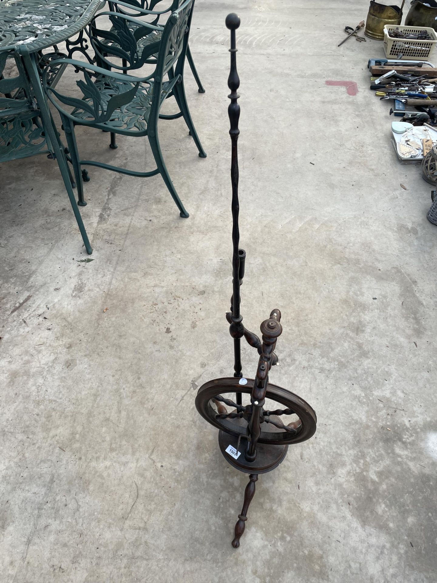 A VINTAGE MAHOGANY SPINNING WHEEL