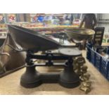 TWO VINTAGE SETS OF WEIGHING SCALES AND SET OF BRASS WEIGHTS