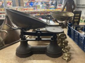 TWO VINTAGE SETS OF WEIGHING SCALES AND SET OF BRASS WEIGHTS