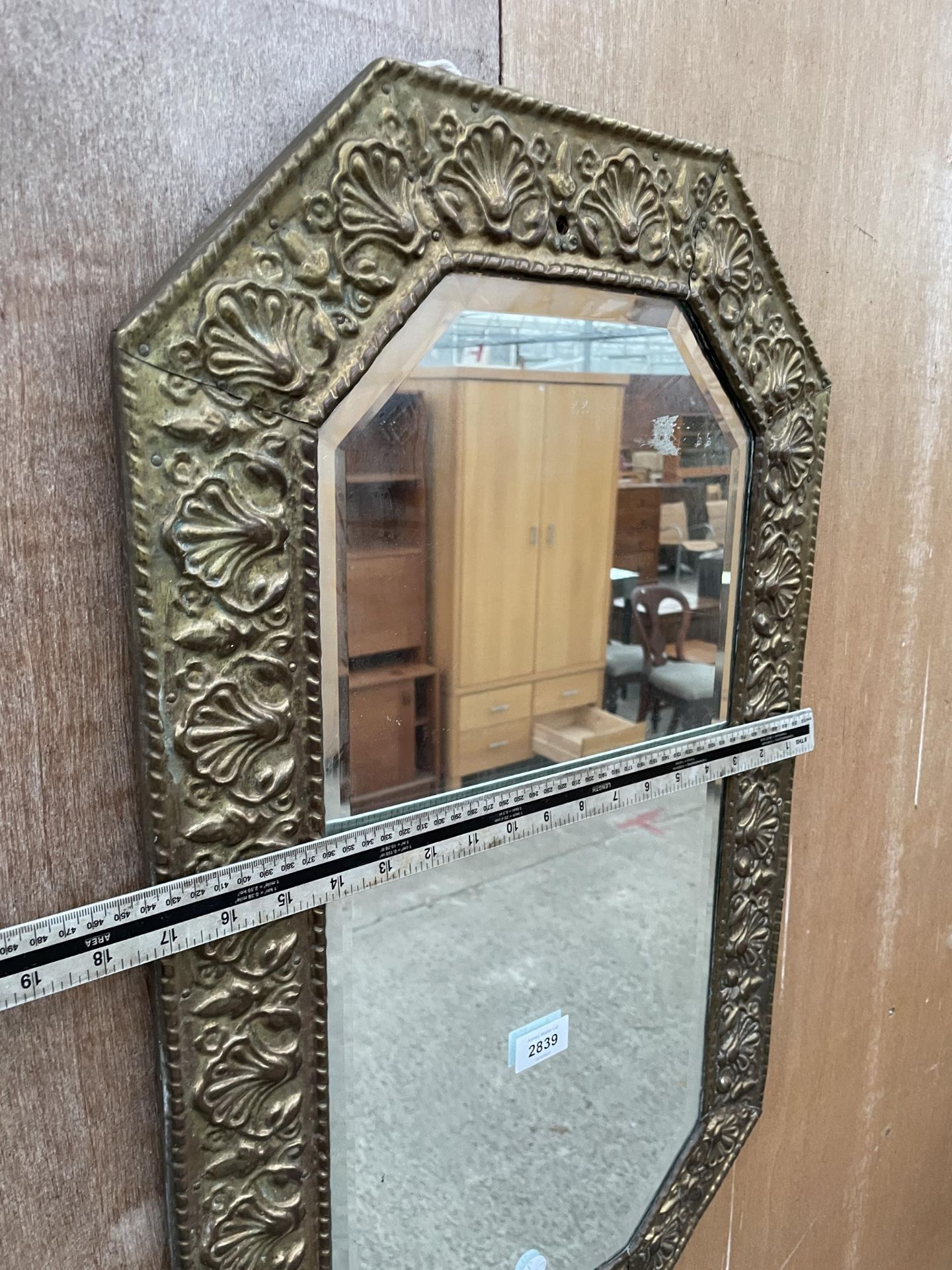 AN EMBOSSED BRASS WALL MIRROR - Image 2 of 2