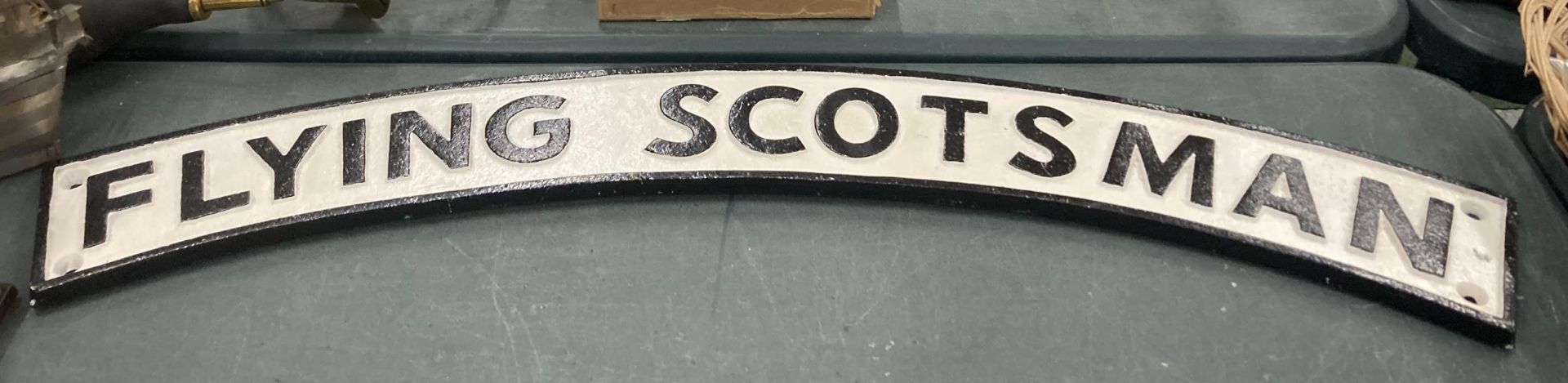 A HEAVY CAST FLYING SCOTSMAN SIGN, THREE FOOT LONG