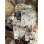 A LARGE STAR WARS MODEL OF A MILLENIUM FALCON - SOME PARTS MISSING, PLUS TWO WOODEN FIGURES