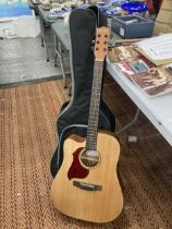 A NEW WITH CASE DONNER ACOUSTIC GUITAR