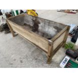 A LARGE VINTAGE WOODEN TROUGH PLANTER (L:183CM W:70CM)