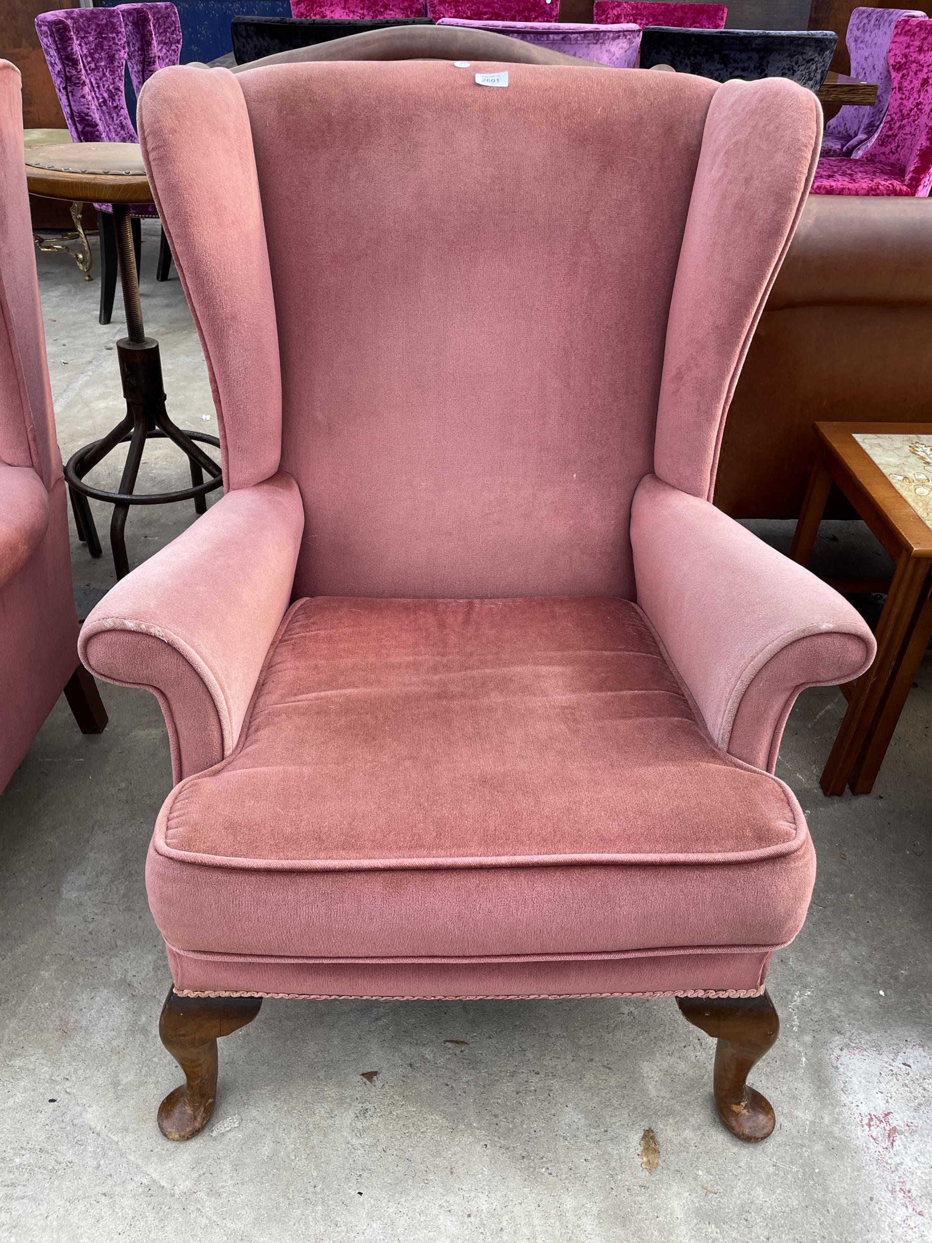 A PARKER KNOLL WINGED CHAIR MODEL NO. PK.720/45 MK.3