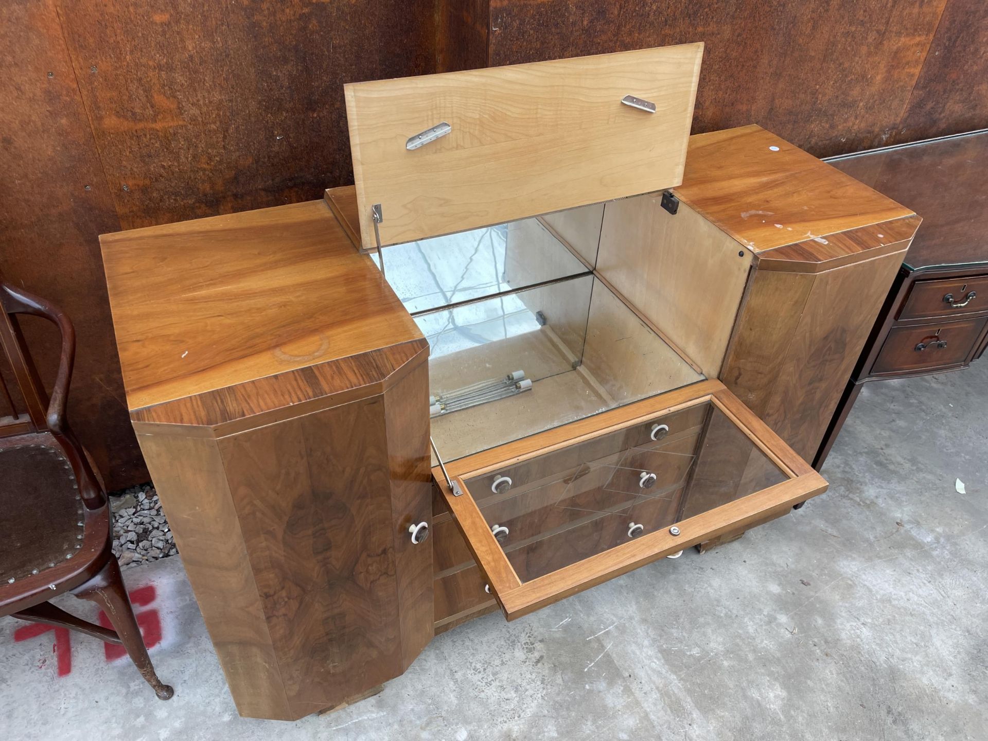A WALNUT ART DECO COCKTAIL SIDEBOARD WITH MIRRORED DROP-DOWN FRONT, TWO CUPBOARDS AND THREE DRAWERS, - Image 3 of 4