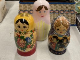 A GROUP OF THREE RUSSIAN LACQUERED DOLLS