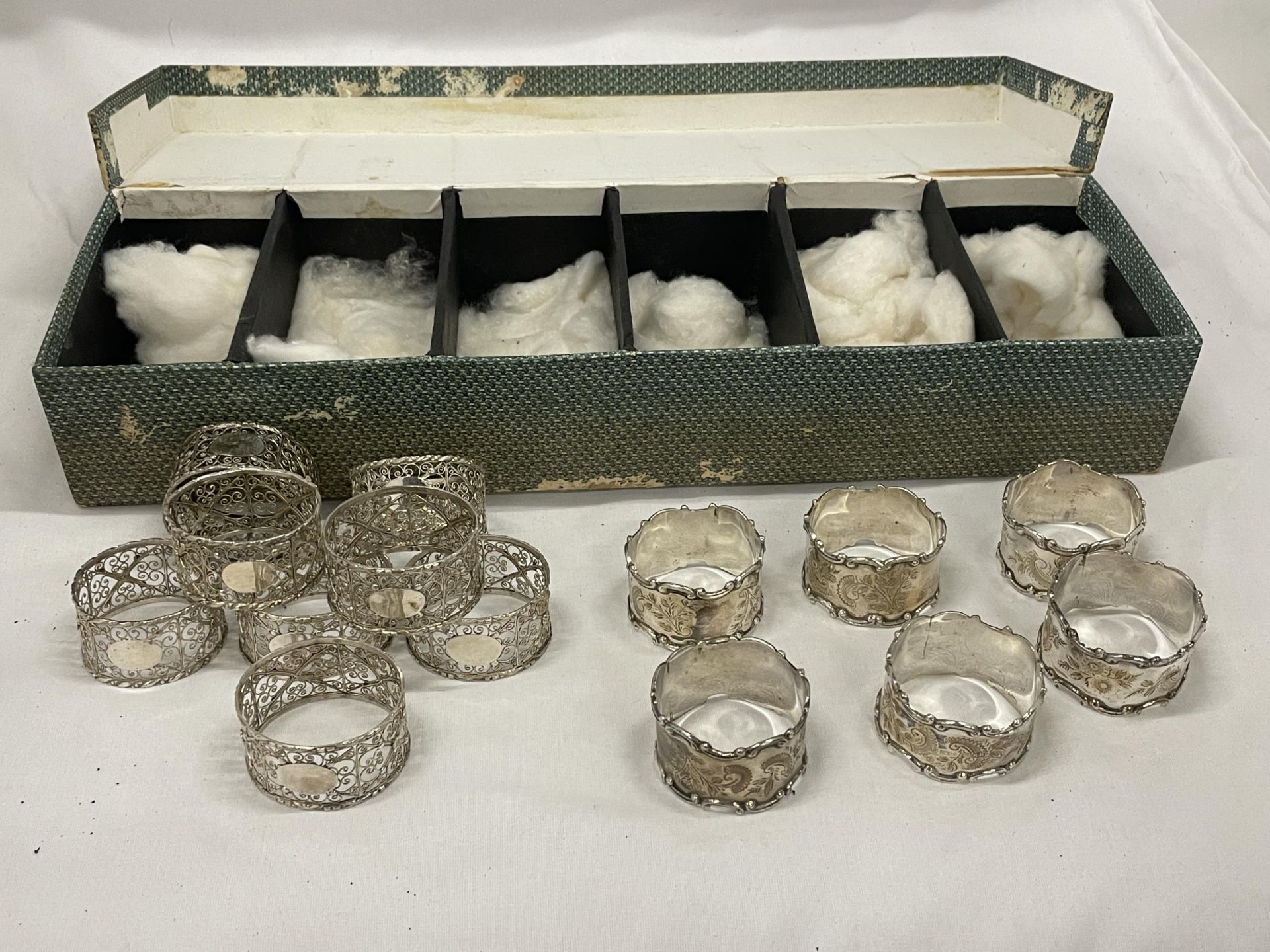FOURTEEN NAPKIN RINGS SIX HALLMARKED SILVER AND EIGHT POSSIBLY SILVER