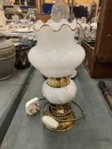 A VINTAGE BRASS AND MILKY GLASS TABLE LAMP