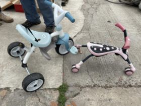 A CHILDS SCRAMBLE BUG AND A TRICYCLE