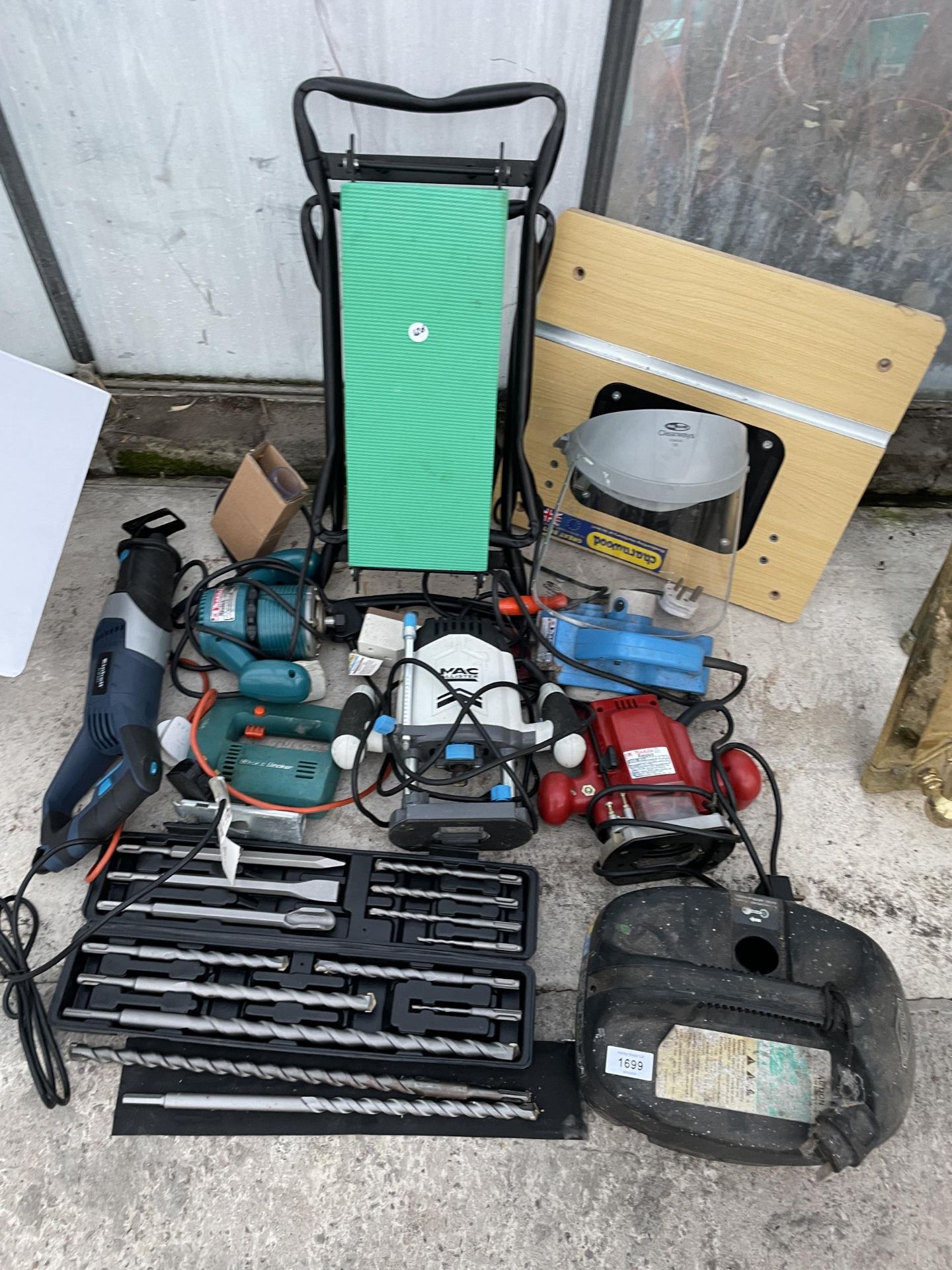 A LARGE QUANTITY OF TOOLS TO INCLUDE A MACALLISTER ROUTER, MAKITA ROUTER AND AN EINHILL