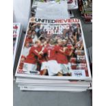 A BELIEVED COMPLETE SET OF MANCHESTER UNITED PROGRAMMES FROM THE 2004-2005 SEASON