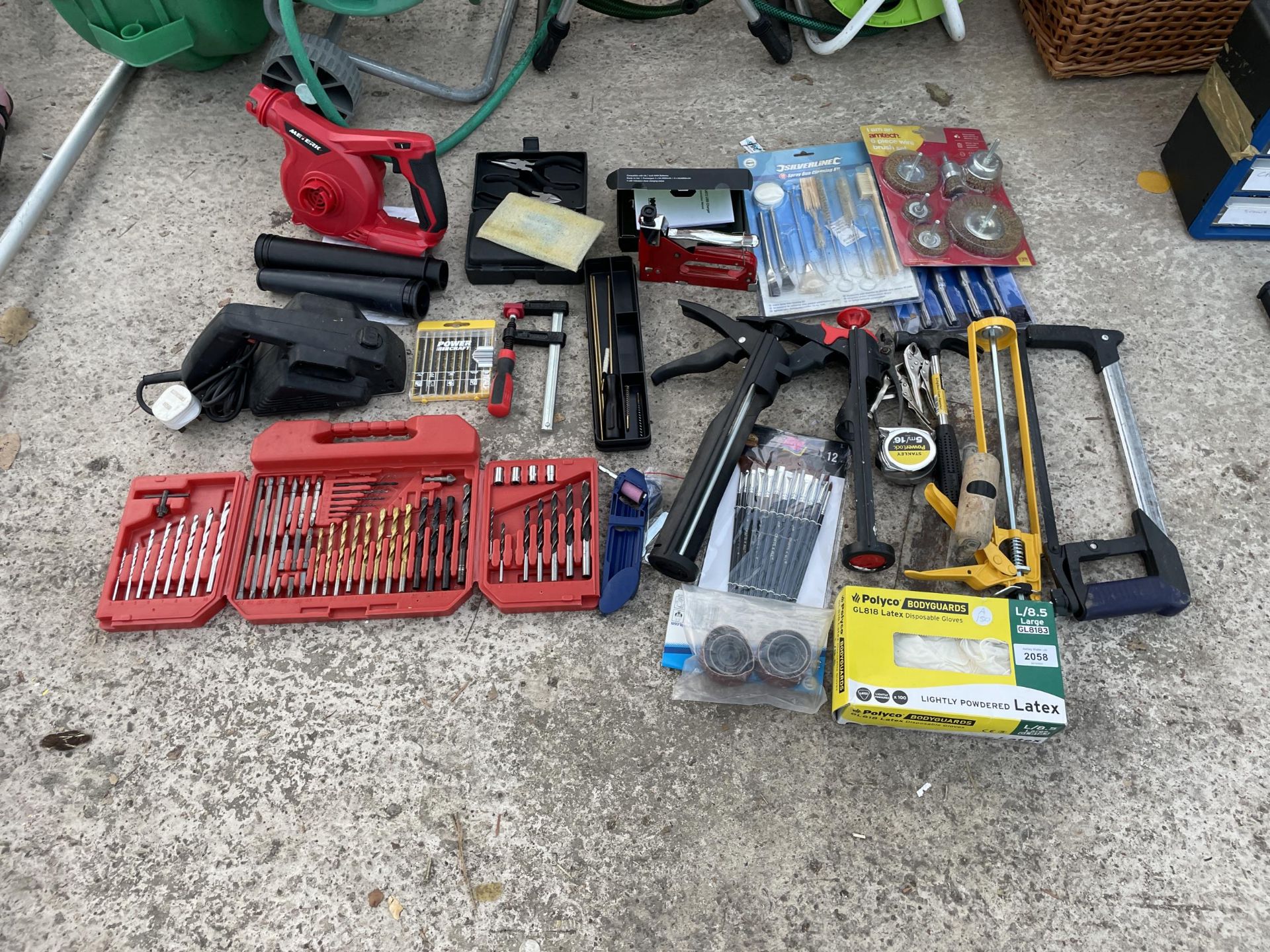 A LKARGE ASSORTMENT OF TOOLS TO INCLUDE DRILL BITS, A WOOD PLANE AND PLIERS ETC