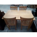 A MODERN OAK EXTENDING DINING TABLE, 52 X 32" (LEAF 19") AND FOUR RUSH SEATED CHAIRS