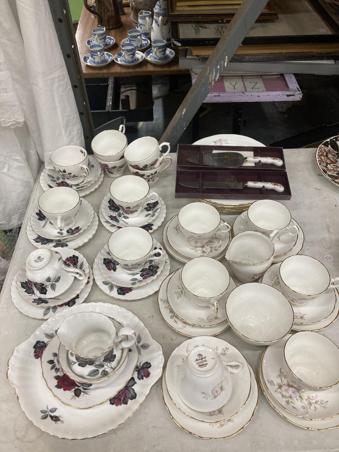 TWO PART CHINA TEASETS, MONTFORT AND RICHMOND, TO INCLUDE A CAKE PLATE, PLATES, CUPS, SAUCERS,