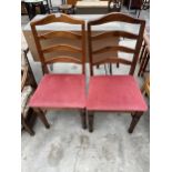 A PAIR OF MODERN PINE LADDER BACK DINING CHAIRS