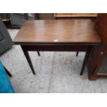 A 19TH CENTURY MAHOGANY FOLD-OVER GAMES TABLE, 36" WIDE