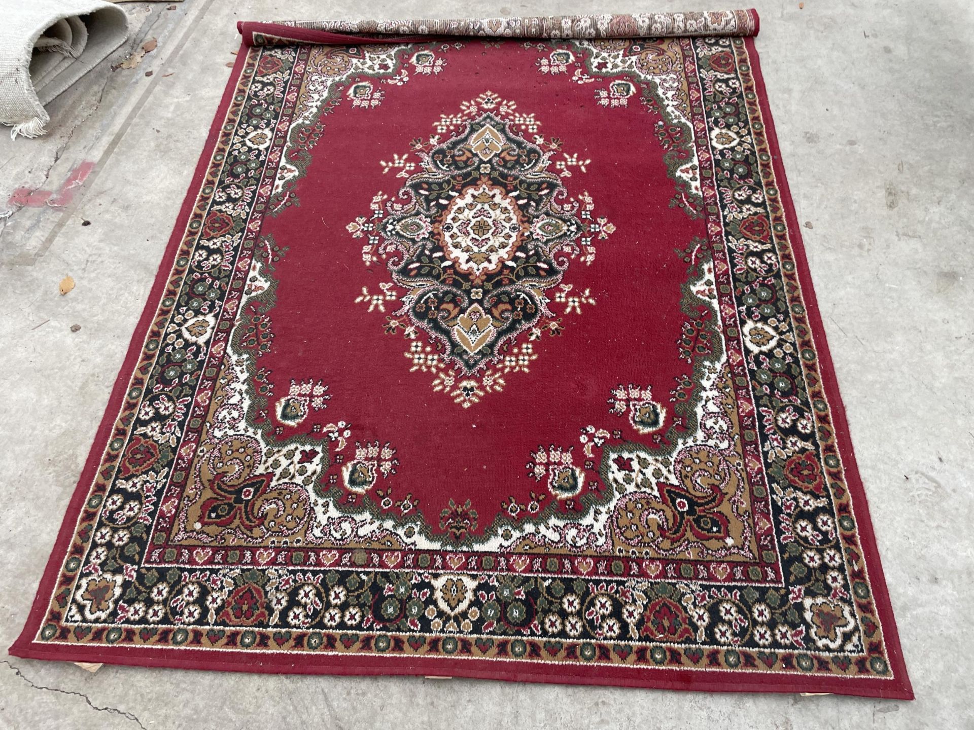 A RED PATTERNED RUG