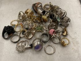A COLLECTION OF COSTUME JEWELLERY RINGS ETC