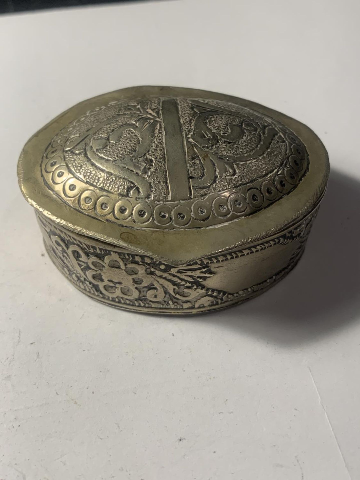 A LOW GRADE ASIAN SILVER TRINKET BOX