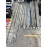 A SET OF STEEL FENCE POSTS AND INTERLOCKING RAILS